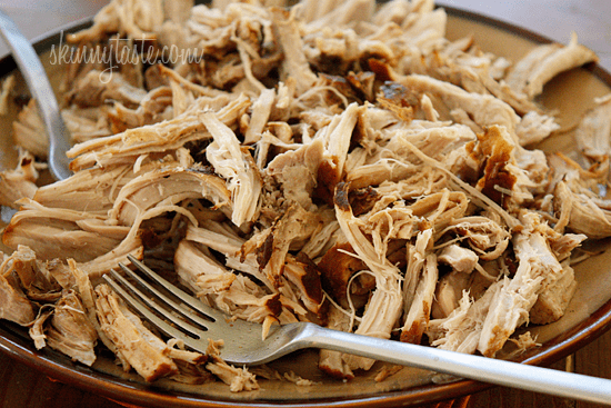 Boneless pork roast slow cooked in Asian spices creates a aromatic pork dish with mushrooms and broth, perfect over noodles or rice with fresh chopped green onions, cilantro and sriracha.