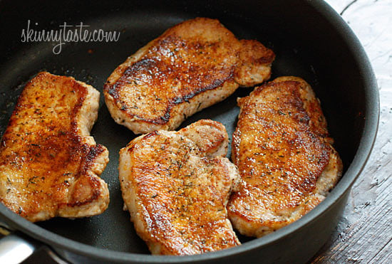 Pork loins being lightly pan fried.