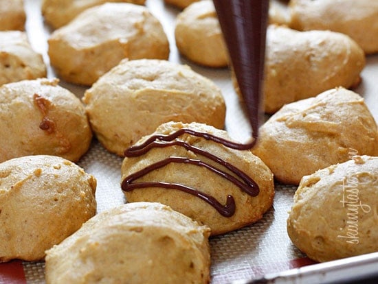 Low-fat pumpkin spice cookies have a cake ball quality to them, drizzled with a chocolate glaze, they are seriously good!