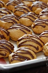 Low-fat pumpkin spice cookies have a cake ball quality to them, drizzled with a chocolate glaze, they are seriously good!
