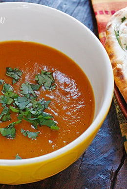Coconut milk, cumin, garam masala, curry powder and cilantro balance the sweetness of the roasted red kuri squash, creating this aromatic Indian inspired soup. Serve this with a piece of garlic naan and you have yourself a meal.
