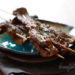 Thin strips of grilled flank steak marinated with lime juice, ginger, garlic, sesame oil and soy sauce. These skewers disappear quickly at every gathering, so you may want to make a lot!