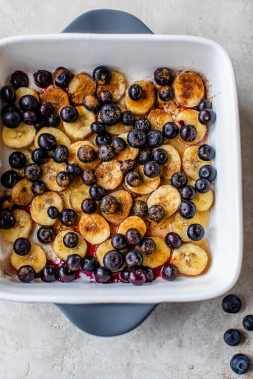 bananas and blueberries in baking dish