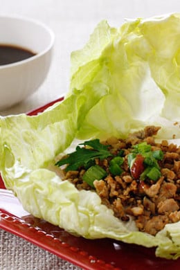 These quick and easy authentic Asian Chicken Lettuce Wraps are so delicious, made with sautéed ground chicken thighs, shiitake mushrooms and water chestnuts seasoned with Asian spices served in a crispy cold lettuce leaf with a spicy hoisin dipping sauce.