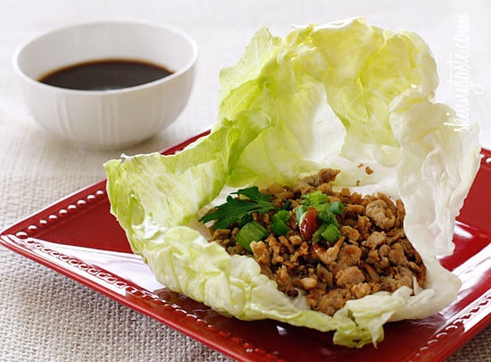 These quick and easy authentic Asian Chicken Lettuce Wraps are so delicious, made with sautéed ground chicken thighs, shiitake mushrooms and water chestnuts seasoned with Asian spices served in a crispy cold lettuce leaf with a spicy hoisin dipping sauce.