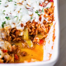 This Stuffed Cabbage Casserole is basically a deconstructed version of stuffed cabbage layered with shredded cabbage, ground beef and brown rice cooked in tomatoes then topped with melted cheese. It's SO good!