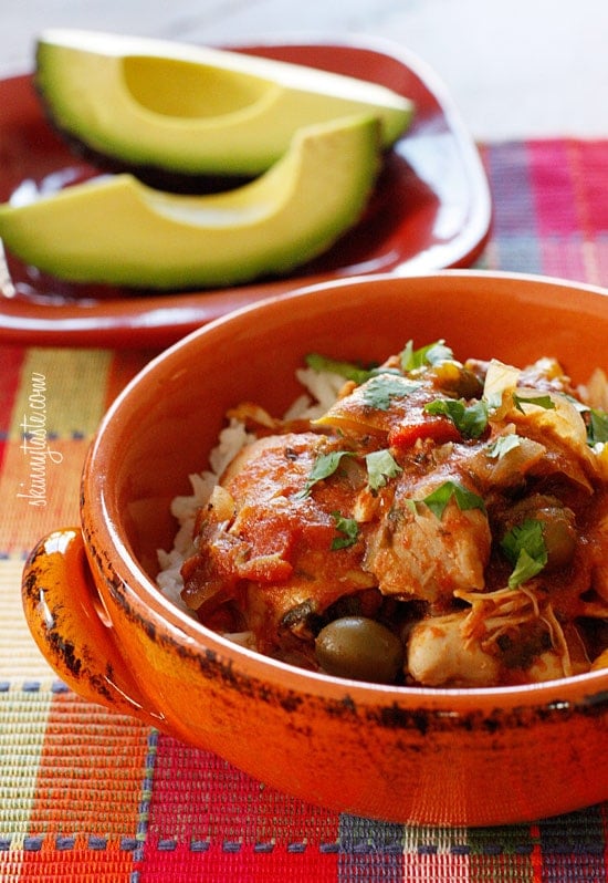 Chicken a la Criolla, a simple yet flavorful Latin dish made with stewed boneless skinless chicken thighs bell peppers, onions, garlic, tomatoes, olives, cilantro and spices.