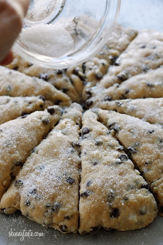 Skinny Chocolate Chip Buttermilk Scones are sweetened just to perfection studded with chocolate chips. Kind of like eating a giant chocolate chip cookie for breakfast!