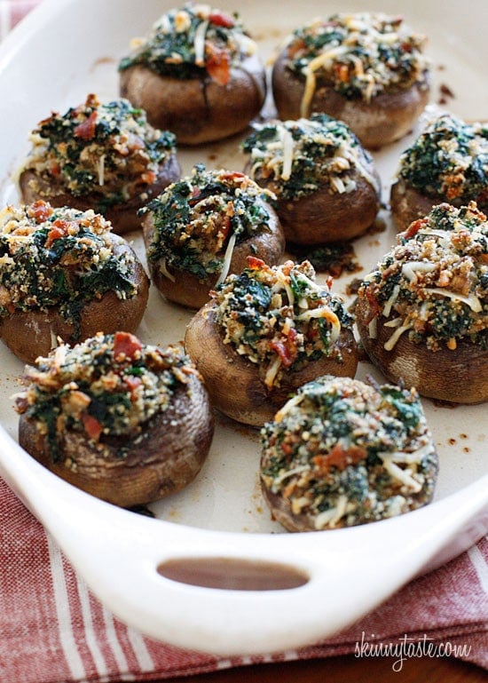 Spinach and Bacon Stuffed Mushrooms stuffed with sautéed baby spinach, chopped mushrooms, bacon, bread crumbs and Parmesan cheese – a lighter alternative to traditional stuffed mushrooms yet loaded with tons of flavor!