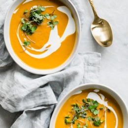 This healthy Carrot Ginger Soup is made with fresh carrots, a hint of fresh ginger and a touch of sour cream blended together until creamy, perfect for lunch or dinner. You can make it vegan or dairy-free by swapping the cream for coconut milk.