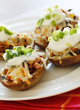 Skinny potato skins loaded Santa Fe style with mildly spiced turkey, black beans, corn and tomatoes topped with cheese - you won't be able to stop at just one!