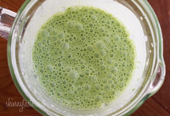 A skinny tropical green smoothie made with pineapple, shredded coconut and bananas, then blended with spinach, light coconut milk and Greek yogurt. High in Vitamin A, B-6, C, Manganese and fiber.