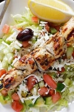 Marinated chunks of grilled chicken breast served over a bed of lettuce with feta, fresh diced tomatoes, cucumbers, green peppers, black olives, red onions, parsley and dill tossed in olive oil and fresh lemon juice.