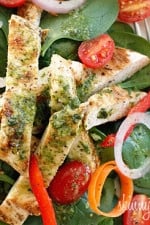 Chicken marinaded with lemon, garlic and oregano, then grilled to perfection and served over a colorful spinach salad. Topped with a white balsamic vinaigrette, does it get better than that?
