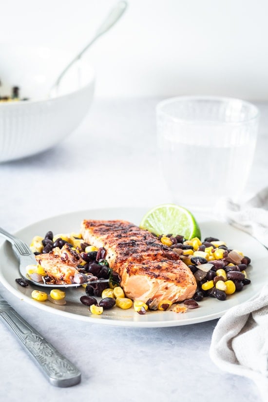 Grilled salmon with smoked spices with corn and black bean sauce