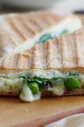 Melted Swiss cheese, asparagus, prosciutto, arugula and garlic mayonnaise pressed in a ciabatta panini. Did that just make your stomach growl?