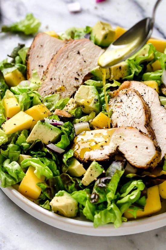 Grilled Chicken pairs beautifully with avocados and mangoes in this delicious salad, perfect for those warmer nights you don't want to heat up the kitchen.