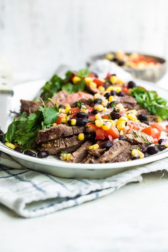 Steak with black beans and corn sauce