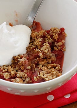 The perfect ending to a meal is a homemade warm fruit crisp topped with a dollop of whipped cream. Spring rhubarb and strawberries are the perfect combination of sweet and tart and work so well together for this comforting dessert.