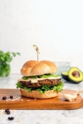 Black bean burgers on wooden board.