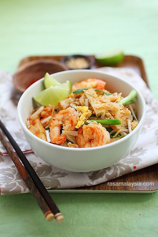 This super easy and delicious shrimp pad thai is made with rice noodles, bean sprouts, chives, tofu, fried egg and topped with a lime wedge – YUM! 