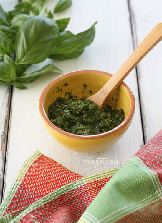 Pesto is one of the things I whip up all summer long, but pesto can have a lot of oil and fat when made traditionally which can make a dish heavier than I would want, so to make it skinny I use a bit less oil and leave the pine nuts out and no one ever complains.