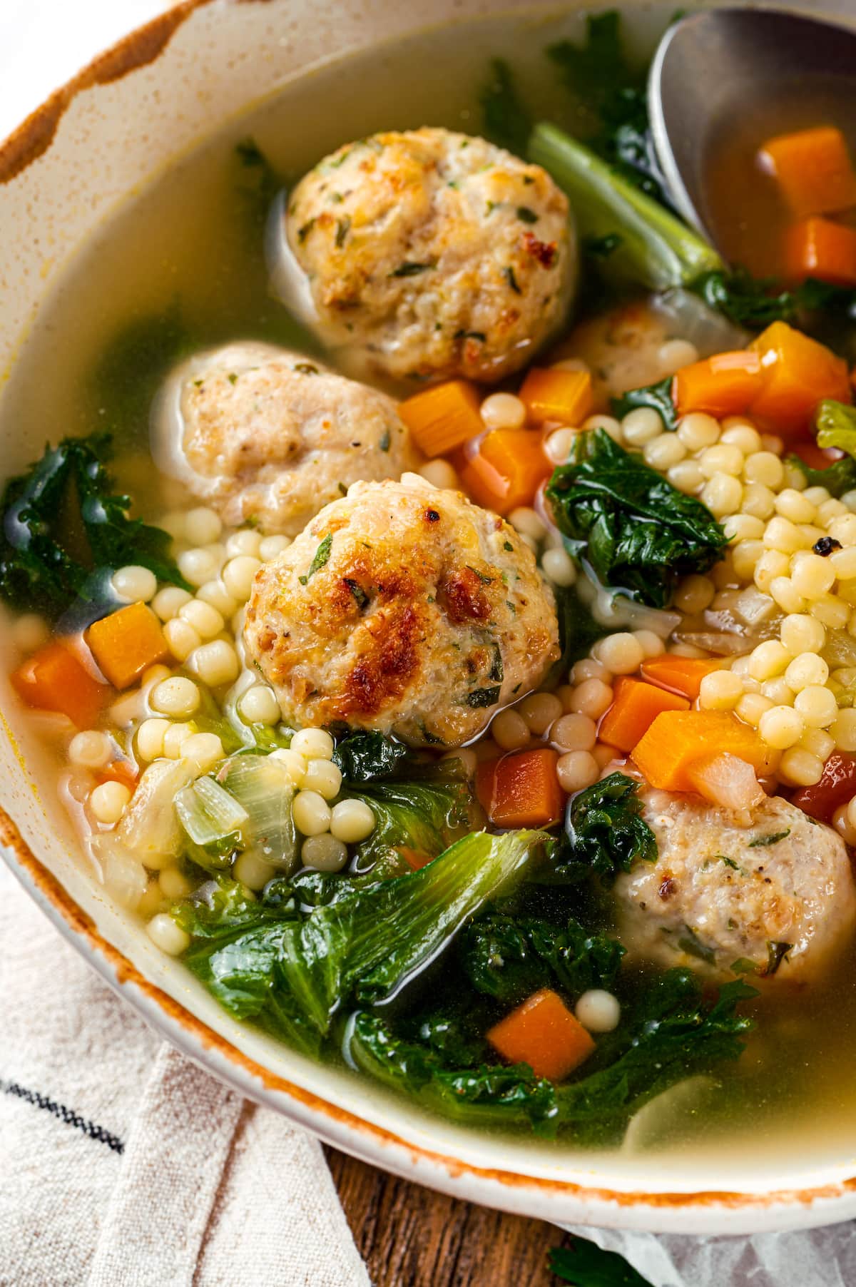 Close up of a bowl of Italian wedding soup