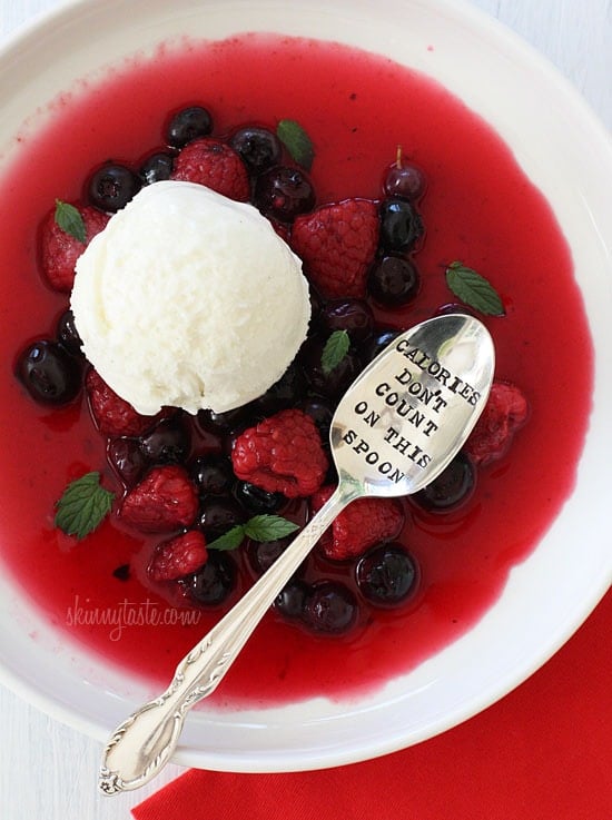 A simple, chilled sweet berry soup topped with fresh berries and mint topped with frozen yogurt. The perfect dessert if you're having company because you make it ahead and keep it chilled until ready to serve.