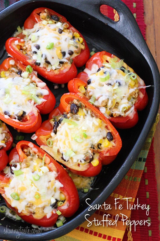Santa Fe inspired stuffed bell peppers loaded with a zesty filling of ground turkey, corn, black beans, hot peppers and tomatoes, topped with melted cheese and scallions.