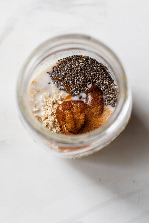 oats, chia and pumpkin butter in a jar