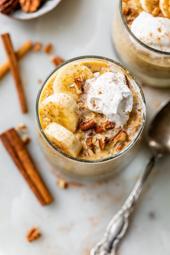 pumpkin oats with whipped cream and bananas