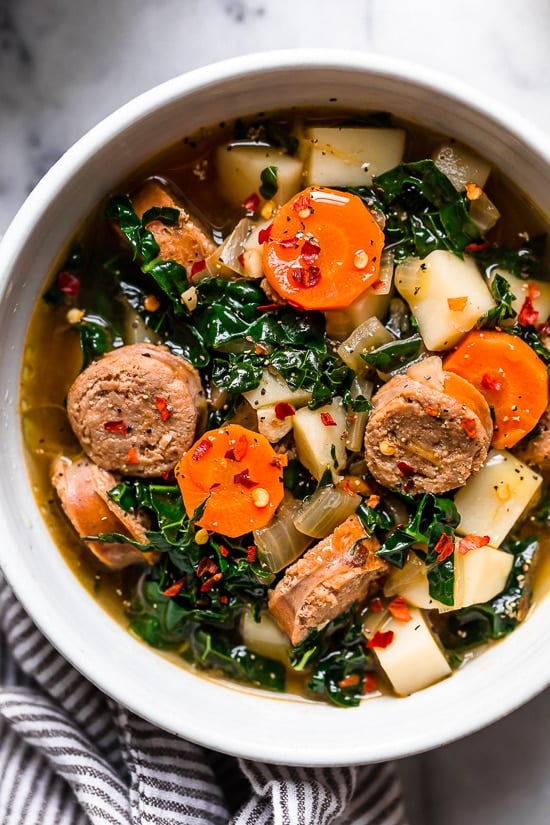 Kale and Potato Soup with Turkey Sausage is an easy, hearty soup made with kale, potatoes, carrots and turkey or chicken sausage. 