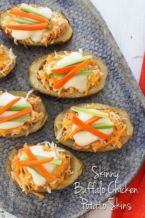 These potato skins are stuffed with shredded buffalo chicken breast made in the crock pot, topped with melted cheese, blue cheese dressing, carrots and celery – they are seriously delicious! What's football without the appetizers. 