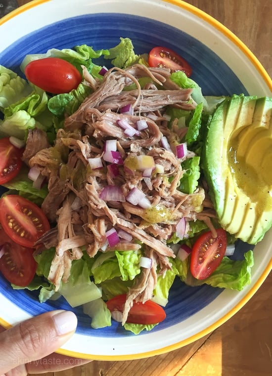 This EASY 3-ingredient slow cooker kalua pork dish has become a staple in my house! We make it at least once a month because it's SO easy and it makes enough for several meals!