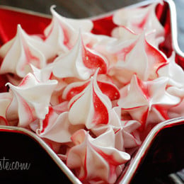 Light and airy peppermint swirls in delicious meringues cookies. 'Tis the season for all things peppermint, shopping and big wooly mittens, cookies and hot cocoa, and of course, cookie exchanges.