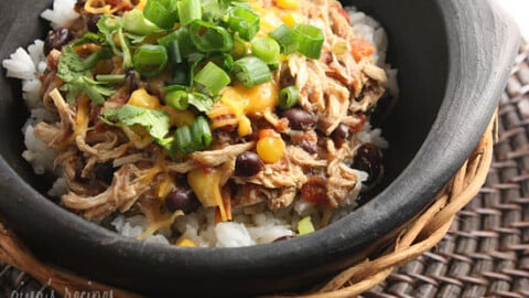 Slow cooker shredded chicken with corn, tomatoes and black beans. Prep this the night before and turn your crock pot on in the morning for an easy weeknight meal.