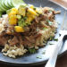 Slow Cooker Jerk Pork with Caribbean Salsa is a delicious pork roast, marinated overnight with fresh citrus juice, garlic, and jerk seasoning. Topped with a bright Caribbean salsa of fresh mangoes, avocado and cilantro.
