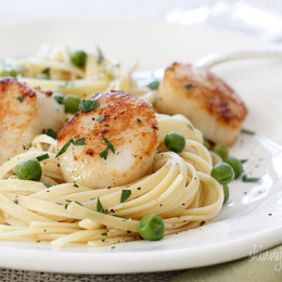 Scallops are great for a quick meal any night of the week and are a real treat. They can be quickly sautéed, then added to salads like this Scallop and Baby Green Citrus Mojo Salad, and this delicious Scallop and Grapefruit Salad, but once in a while when I want something more substantial, I love it with pasta. Here I tossed it with some pasta and peas, for a dinner that took less than 15 minutes to make.