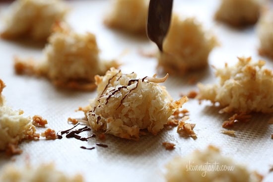 I took last year's plain coconut macaroons and drizzled them with a little chocolate to satisfy my craving. I reduced the sugar a little to compensate for the chocolate and drizzled some chocolate over them once they were done.