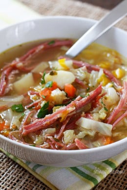Corned Beef and Cabbage Soup made with cabbage, potatoes, bell peppers and aromatics simmered on the stove with corned beef create this wonderful one pot meal – a fun twist on a Classic Irish dish!