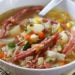 Corned Beef and Cabbage Soup made with cabbage, potatoes, bell peppers and aromatics simmered on the stove with corned beef create this wonderful one pot meal – a fun twist on a Classic Irish dish!