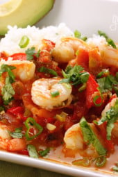 A quick shrimp stew cooked in a tomato coconut broth with a hint of lime and cilantro. Simple enough to make for a weekday dinner yet sophisticated enough to serve to company. Serve with a little brown basmati rice to soak up the broth.
