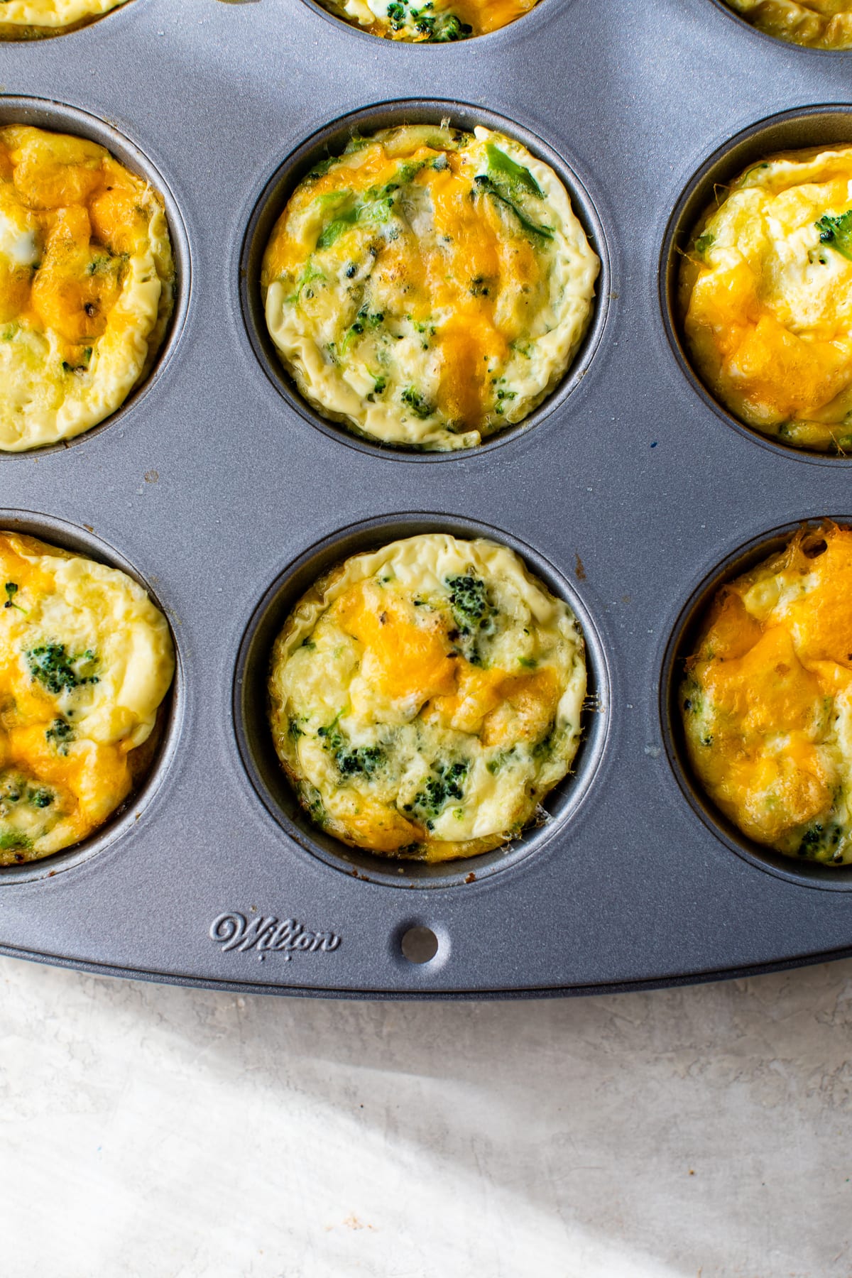 Broccoli and cheese egg muffin molds
