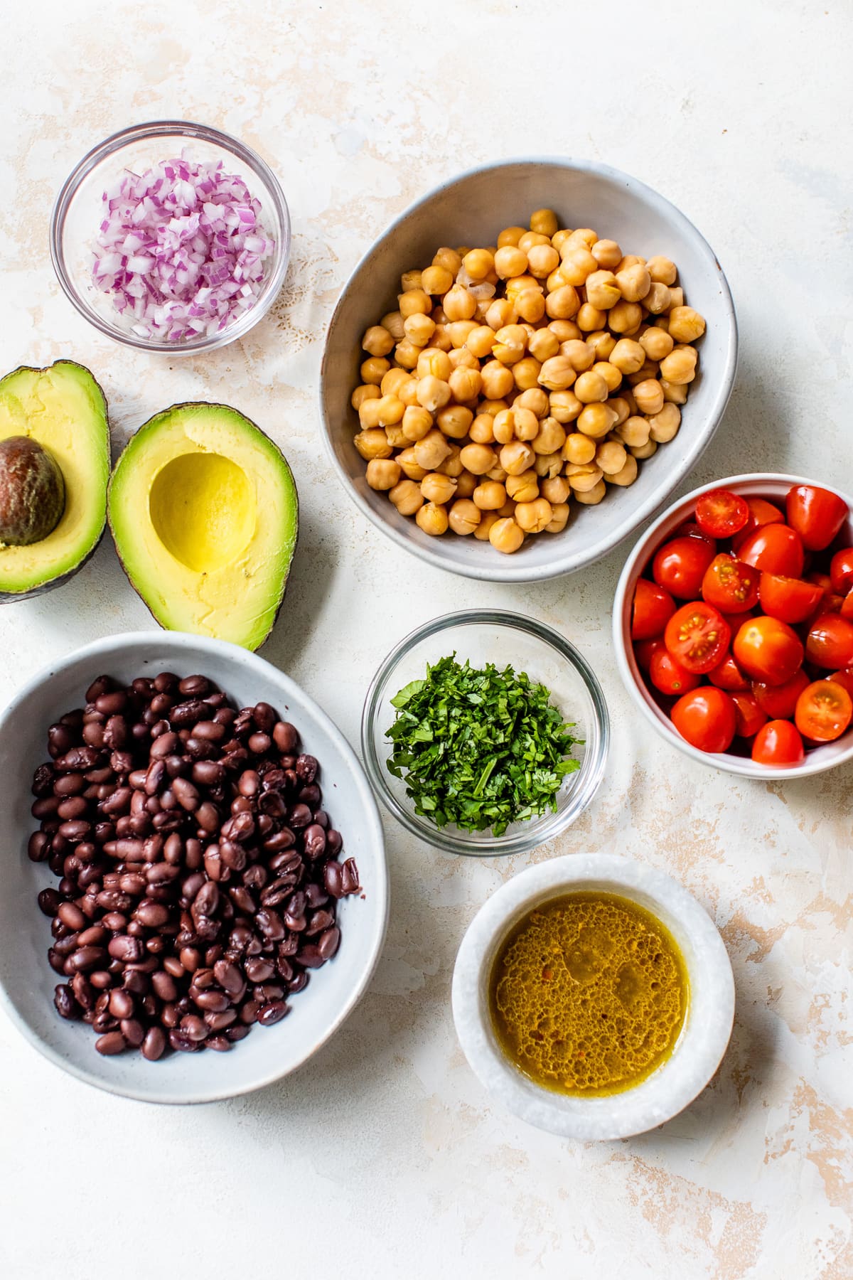 Black beans, chickpeas, avocado and tomato with lime