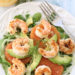 Grilled shrimp, slices of avocado, shaved fennel and oranges are served over baby kale and mixed greens then topped with a citrus vinaigrette.