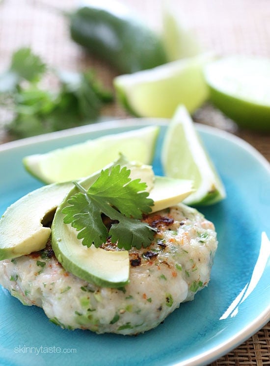 These shrimp cakes are light and delicious, made with jalapenos, scallions, and cilantro then topped with a little fresh lime juice and a few slices of avocado. Serve this over a bed of greens for a quick, light summer meal.