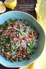 Pearl couscous (otherwise known as Isreali couscous) tossed with asparagus, tomatoes and lemon juice make a vibrant Spring pasta salad that is perfect for lunch, as a side dish, or even to make as a side dish if you are grilling for Mother's Day this weekend!