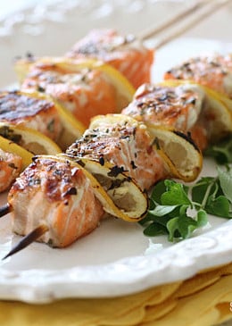 These healthy salmon and lemon kebabs are delicious and easy to make, loaded with omega 3s in every bite! Seasoned with fresh herbs, lemon, and spices and grilled to perfection.