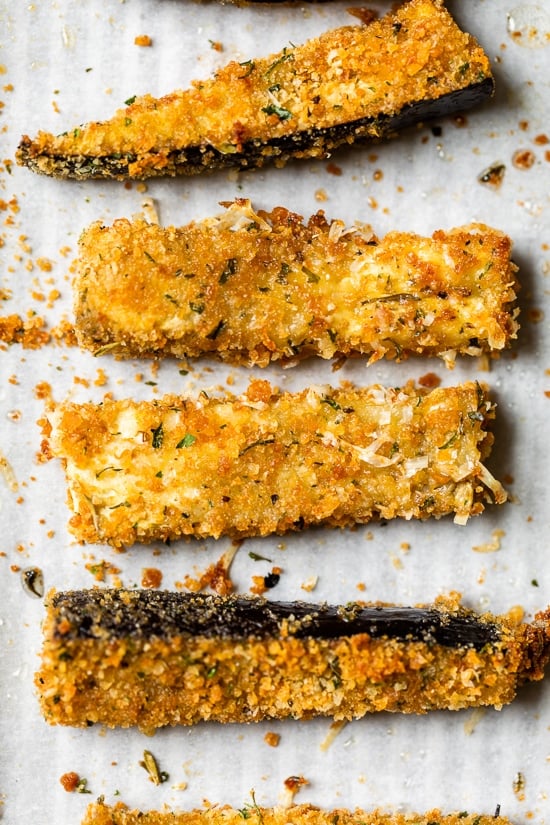 These Baked Eggplant Sticks are breaded with Italian breadcrumbs and Parmesan, baked or air-fried until golden, and served with a quick marinara sauce.