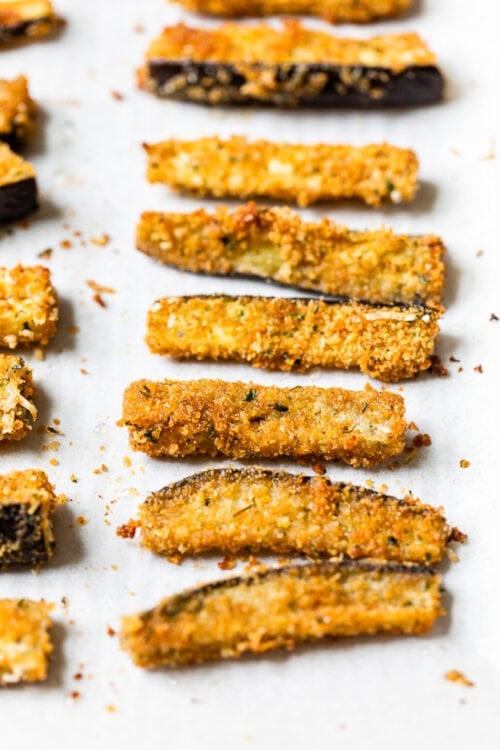 These Baked Eggplant Sticks are breaded with Italian breadcrumbs and Parmesan, baked or air-fried until golden, and served with a quick marinara sauce.